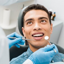 patient looking at dentist 