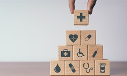 building blocks with different health-related icons on them