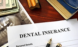 Dental insurance form resting on a table