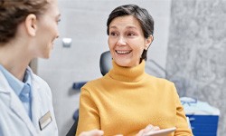 a woman speaking to her dentist