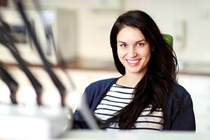 Smiling woman in dental chair