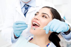 Female patient having a dental exam